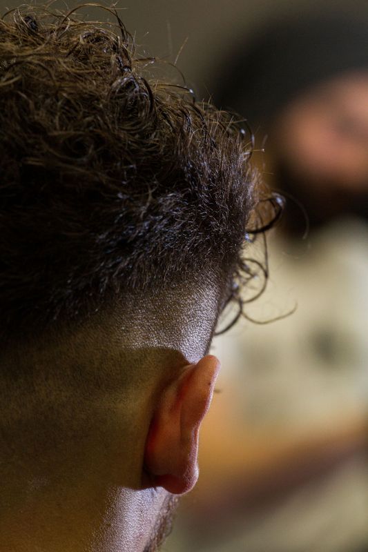 Side profile of a fresh skin fade haircut